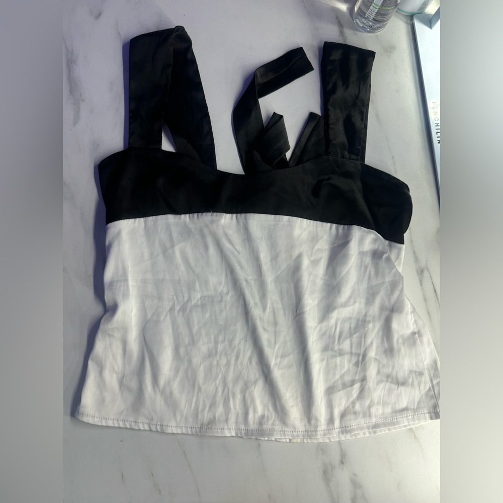White & black blouse with bow